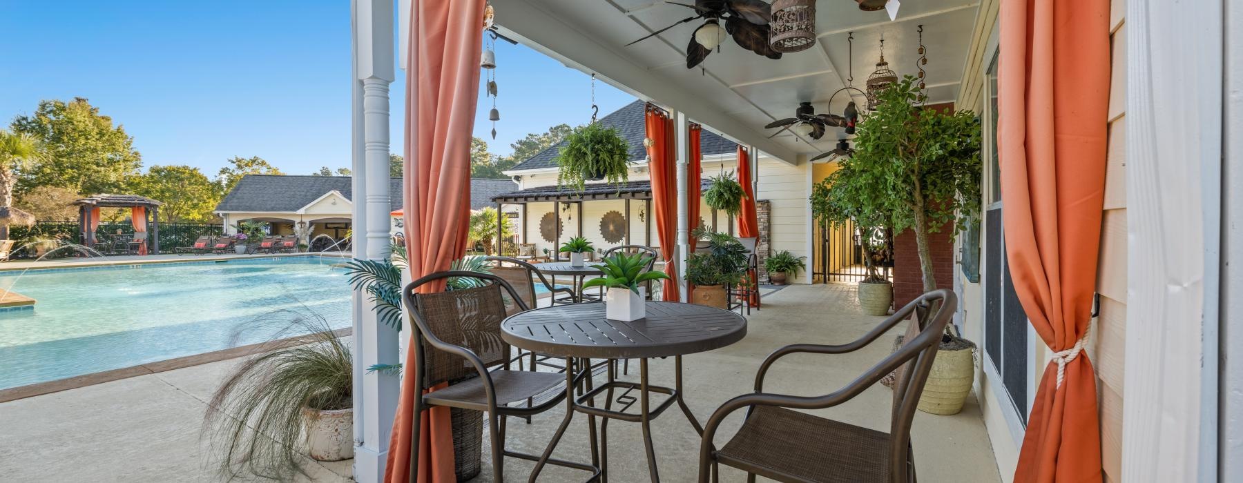 a table and chairs on a patio