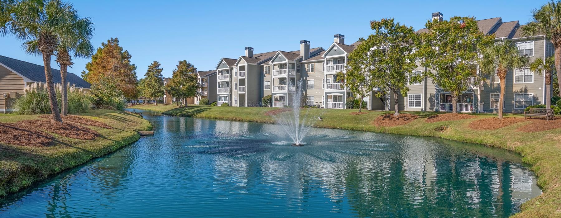 a body of water with houses along it